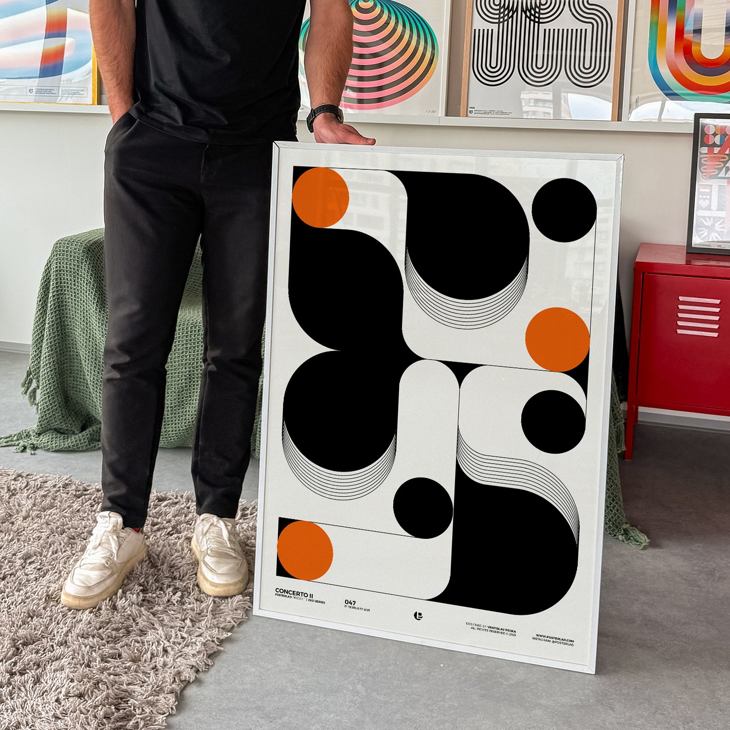 A bold black and white abstract geometric poster with orange accents and flowing curved shapes