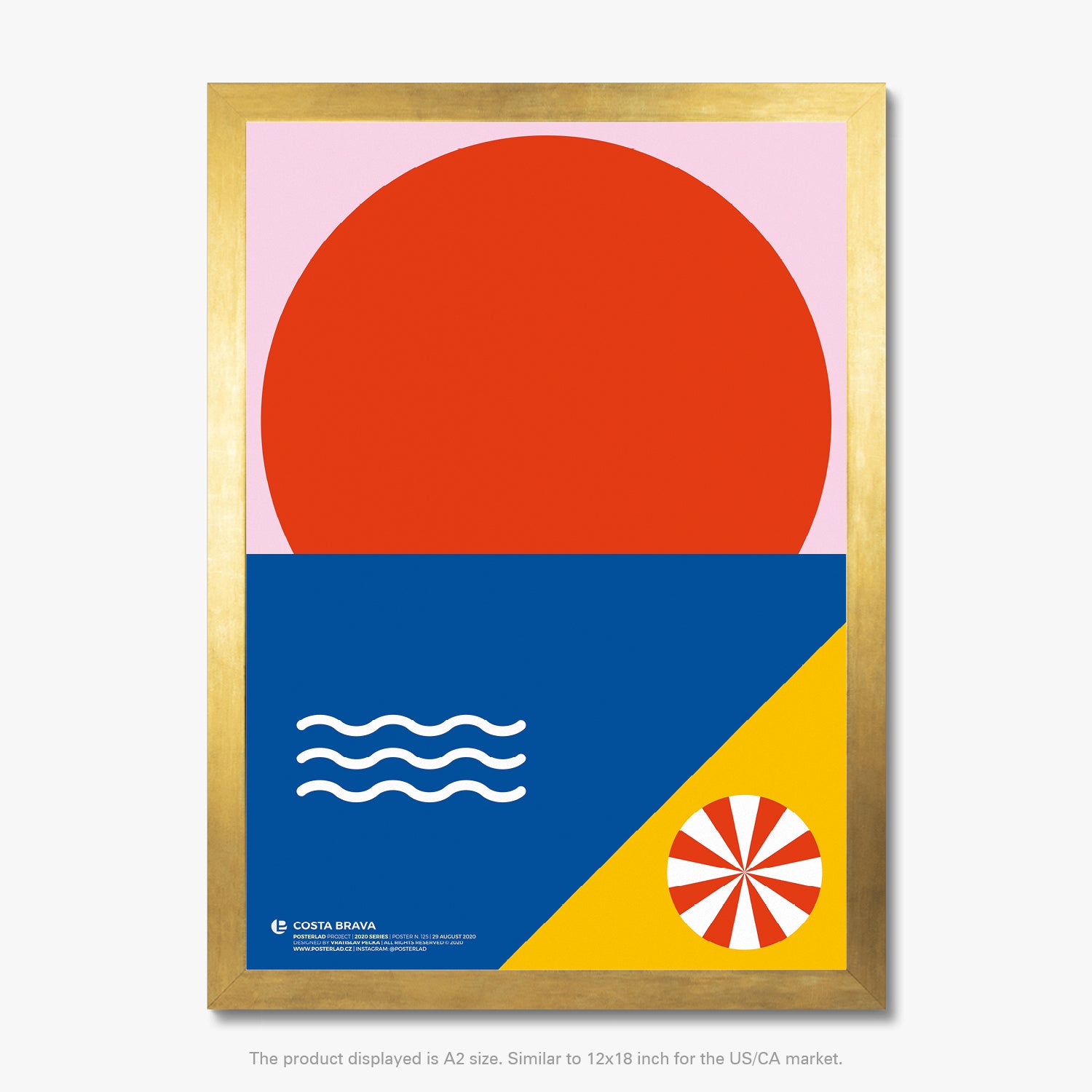Minimalistic red circle on soft pink background evoking setting sun