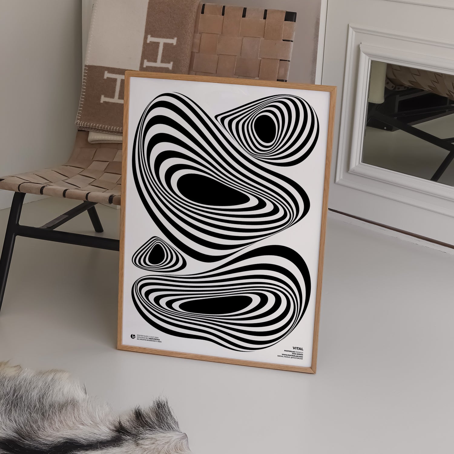 Mesmerizing black-and-white poster Vital featuring organic amoeba-like shapes with concentric stripes, creating an optical illusion of depth and motion